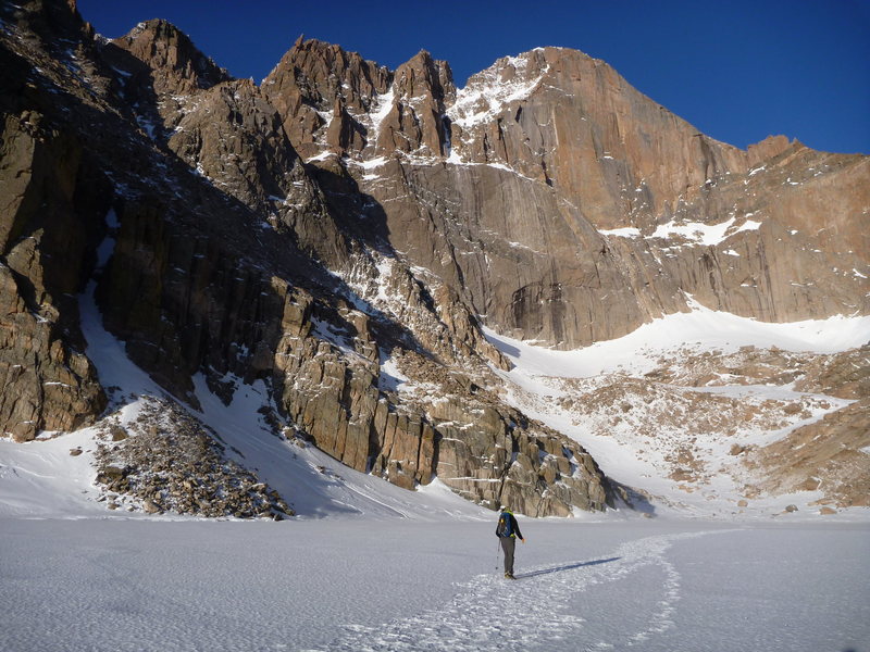 Beta photo. Locate the notch left of the summit. The route goes straight up to the notch from Broadway, starting in the shadow in this pic. At the notch, approach the summit via the south side of the ridge on 5.5 rock.