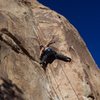 A No Hands Rest at the Crux of "Fire or Retire".Photo By Jeff Laina.