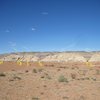 Poto taken from the Hanksville Road entrance.A) End Game 5.7 B)Peuterey Ridge.5.7 C)Its Only Rock and Roll 5.9. D) One Finger Canyon.E) Two Finger Canyon