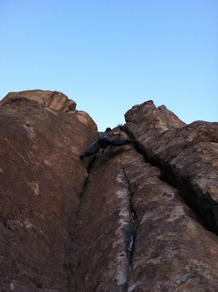 Nick W. in the crux of the second pitch on Big Bruno.