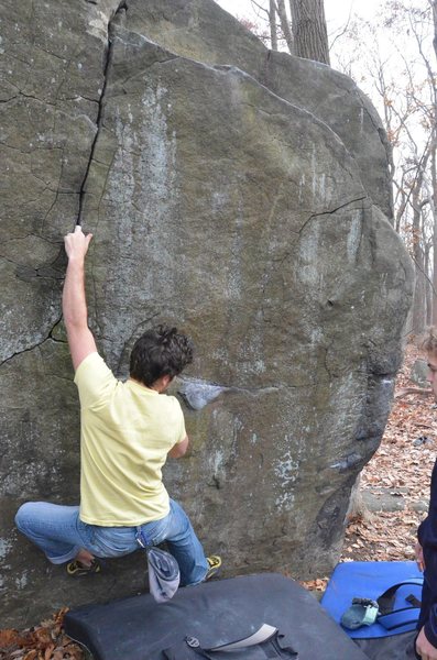 Adam Libert making the crux first move on The Plug.