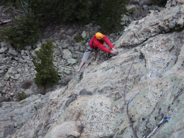 Dave enjoys the easier climbing above the start of P1.<br>
<br>
This pitch is probably 90 feet long.  Also, an 80 foot rappel gets you to the ground from the P1 anchor.