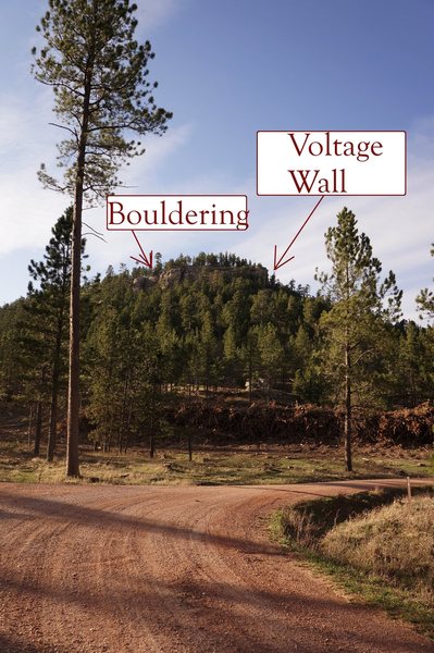 288 goes left and 288 A1 goes right.<br>
I take the right fork to a small pullout just past the curve and hike straight up the hill to get to VOLTAGE WALL!