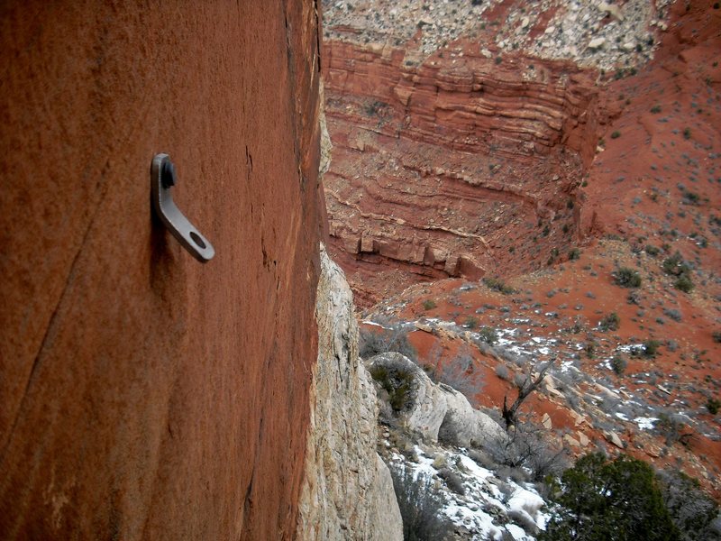 Bolt on first pitch of first ascent route on NE face of NE arete.  This route was later superseded by the NE Arete as it is now known.