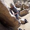 Getting ready to make the High Step, to Clip the First Bolt, on R.M.L. Photo By Jeff Laina.