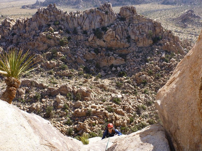 Roxi just after the crux on the 3rd pitch.  Set up a belay in a notch, to keep easy communication.  It's a jaunt to the top from here.