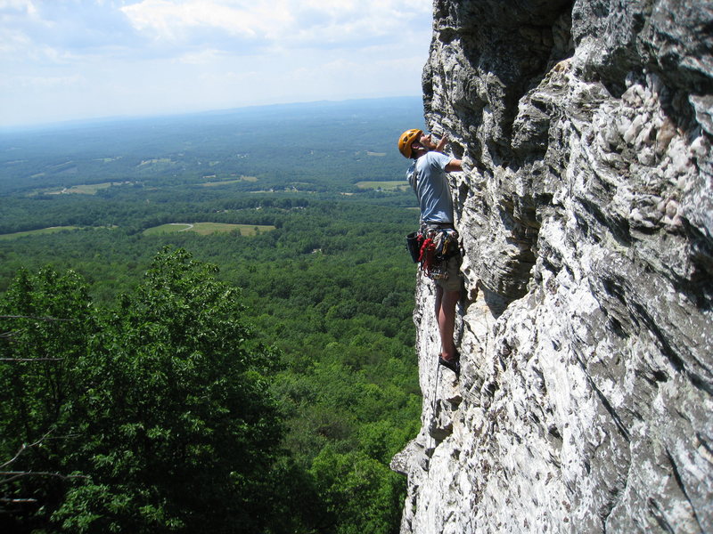 Nearing the top of the pitch. The most fun version heads straight up through a slightly overhanging section of rock before the top out. Photo by Christina B