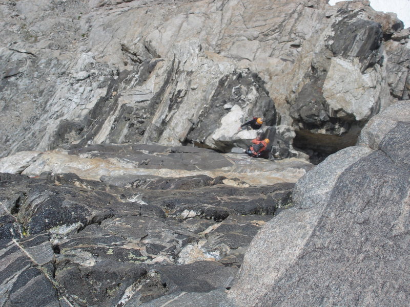 Looking down at the belay below the black face