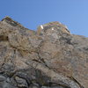 The route above P2.  Slabs, V-slot pitch, Black Face, climbers above the Black Face on the off-balance hand crack pitch.