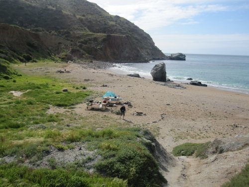 View of Parsons Beach with boulder center at water line