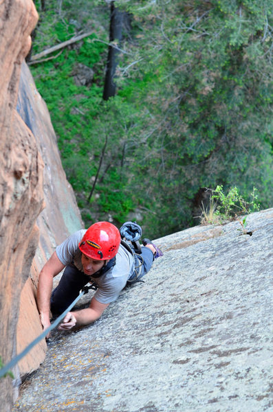 Matt F pulling up the second pitch; below him was the wide crux.