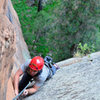 Matt F pulling up the second pitch; below him was the wide crux.