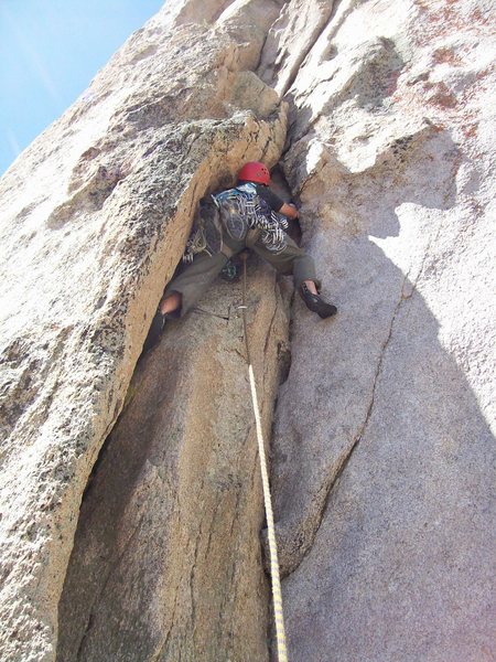 The initial fun crack and stemming moves of the climb.