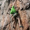 Rawlhide Wall<br>
<br>
Bennett Harris clings to the Thumbundercling pinch<br>
<br>
Disgustipated (5.11) sport<br>
<br>
Crowders  Mountain State Park, North Carolina