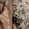 Sarah pulling the crux on First First.