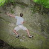 Me doing some moves on the slanting boulder. Crapy photo, but you get the point.