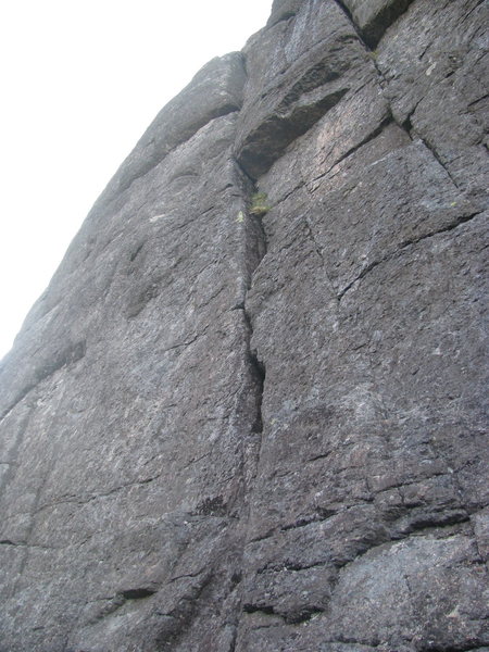 Bad picture but, Ranger Danger on the left leading up to the overhang.  The crack on the right is the start of the routes Fogbound .7 and Gorillas in the Mist .8.