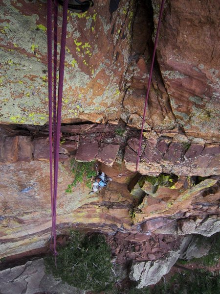 Kat A looks up into the steep center section while following 'Over the Sholder Stuff (5.10)' in Eldo. Photo by Tony B. 3/2012.