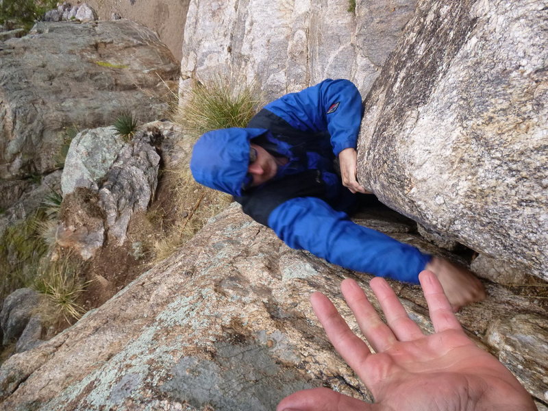 climbing slickrock in the rain