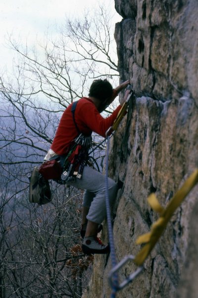 April 1988. Mark Taylor on the P2 traverse of Directissima.