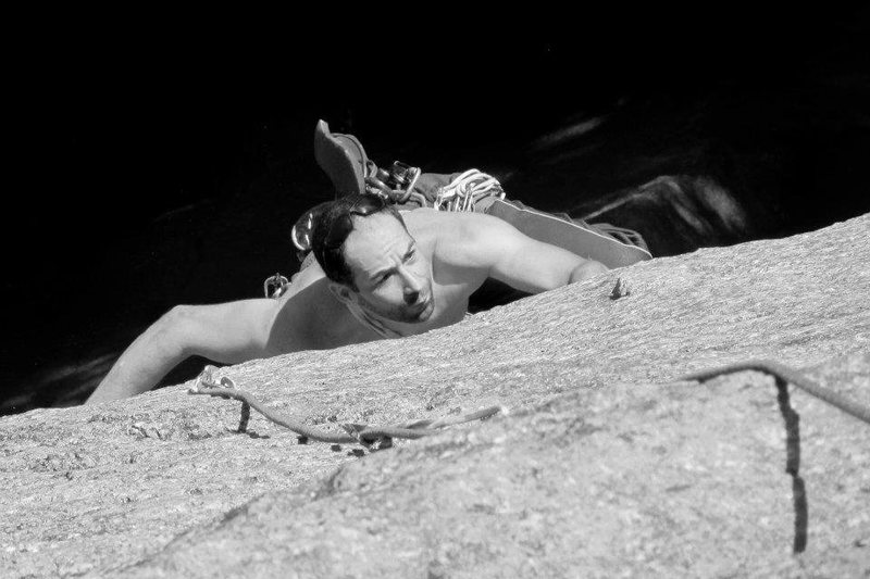 looking down at jakob, about to tackle the crux roof