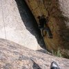 Justin moving through the crux