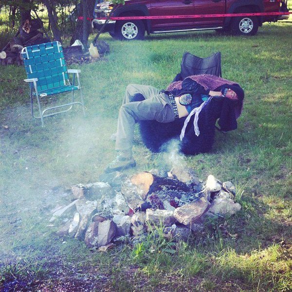 Unknown clubber demonstrating the chair bivy, earlier this season at Mike's climber party. 