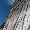 The leftmost hand crack goes at 5.9+ and the right layback at 5.10a