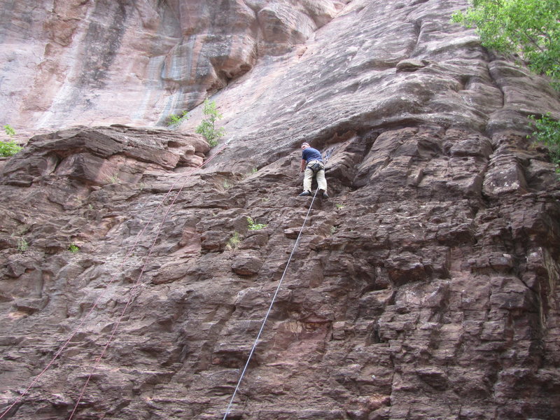 Jeff at the top of Left Handed Blunt. To the left with the wonderful, pink rope is Sesame Street, and above that...is the much harder Justin's Route.