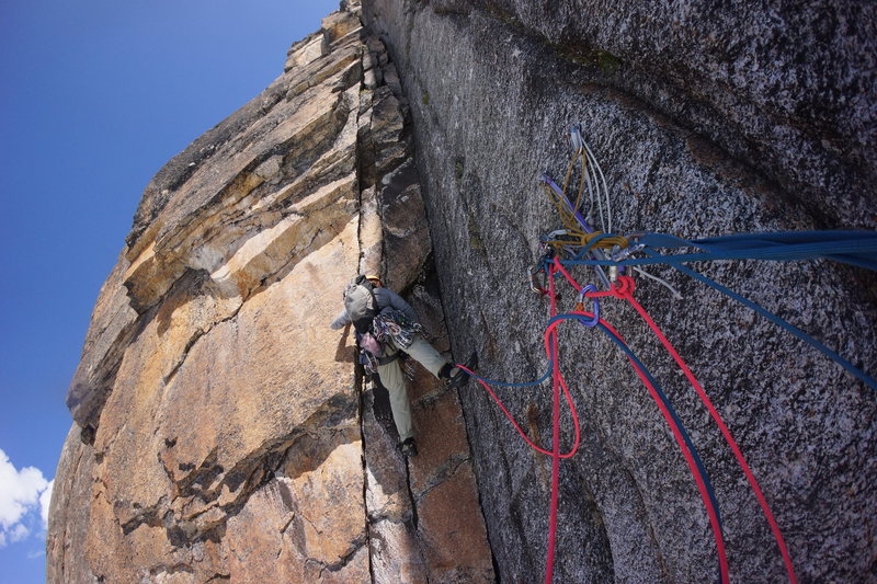 Andrew climbing pitch four.