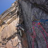 Andrew climbing pitch four.