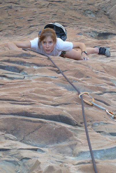 Anna enjoying the fun face climbing on pitch 2.