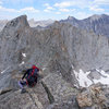 Descending from the summit of Overhanging Tower. Good views of Bollinger Peak (left) & Wolfs Head (right).