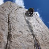 Casey post crux on the golden face of Pitch 5 of the Croft-Rands Left