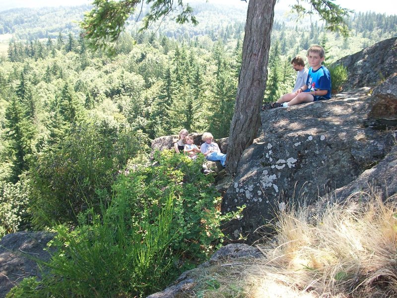 My kids relaxing. Just over the rock behind them are 2 bolts for top roping and repelling. Also the rock they are on makes a very comfortable reclining rest.