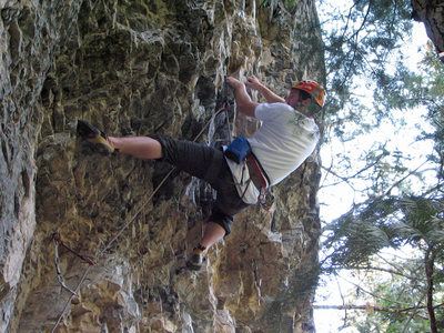 Thomas Holmes surmounting the roof.