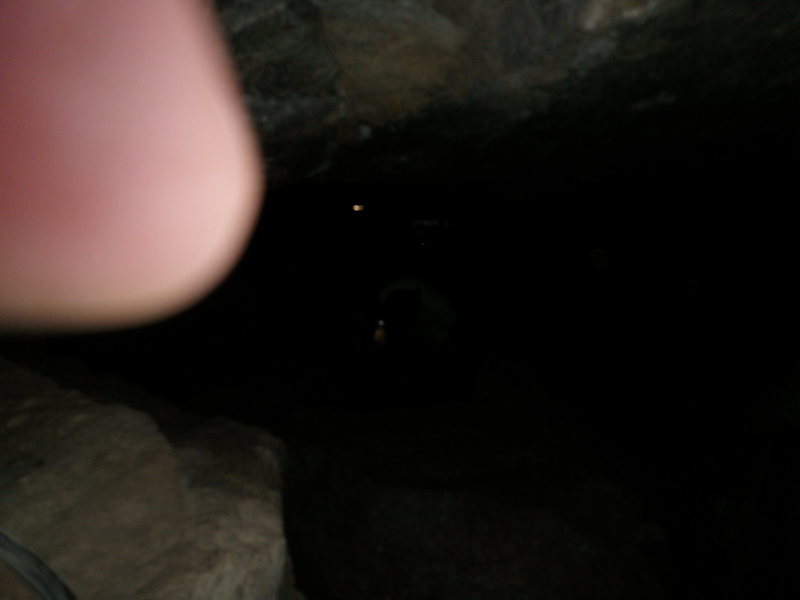 By this point in this one cave we had passed 2 drops about 20 feet and this one was about 12 feet. Almost lost my flashlight in a pool down there. Bring rope with you when you go in here or you can get stuck.