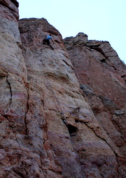 This might help disambiguate the location of this climb a bit.  Note the path of the rope: straight up to the roof, then left, then back right, then straight up to the anchors.