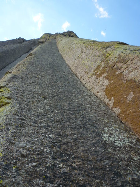 Maid in the Shade (5.11d). One of Devils Tower's best lines.