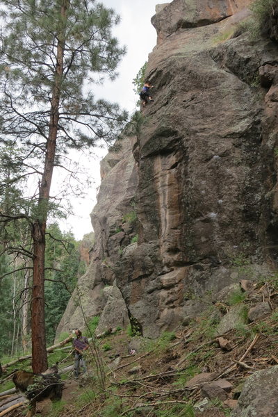 Helen enjoying the fun climbing after the first crux of High Hanging Biscuits.