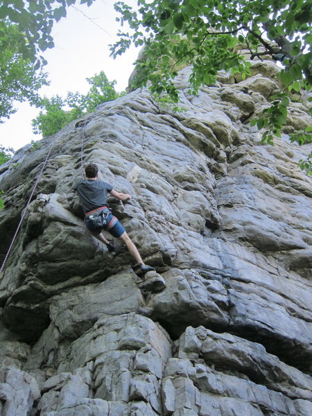 Through the small overhang and up the arete. We used this as a warm up for Black Crack.