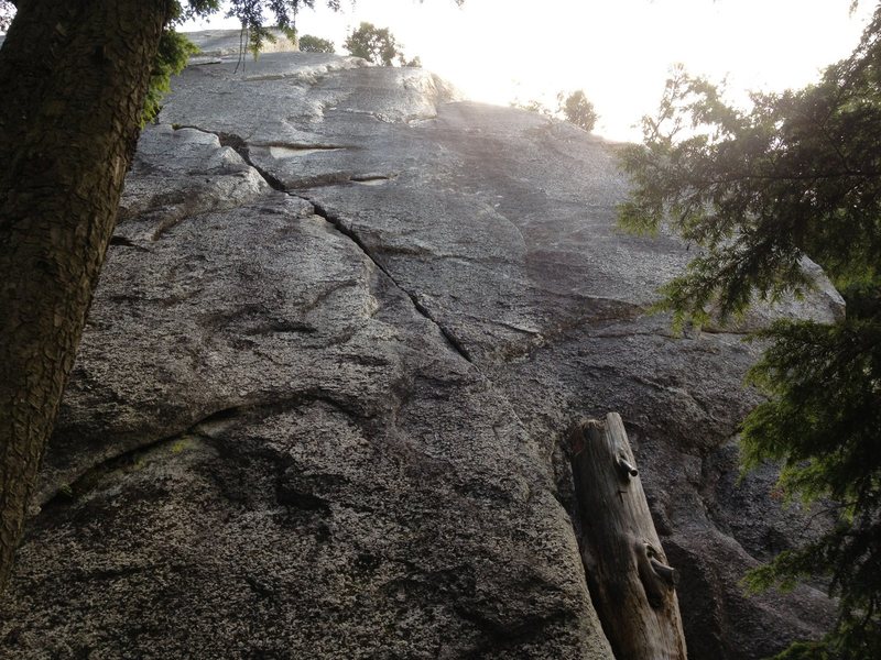 Up the stump and left crack until you reach a great undercling.  Clip the bolt out right, and then up the dihedral.  You can see the bolt in this photo.