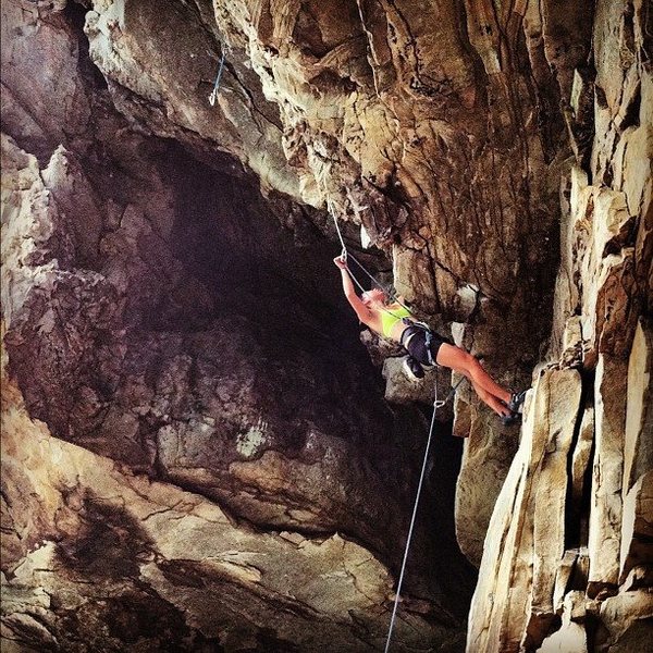 Jessica Wan working Tobacco Road (5.12b) at the Coliseum, Summersville Lake