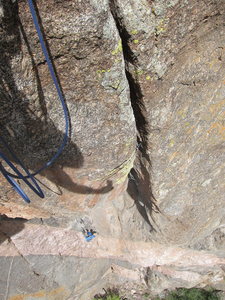 Looking down at Jeff from anchors at the top of the "roof" pitch. Splitter!