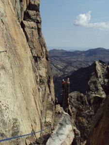 Hamik climbing the mandatory flake before the final traverse.