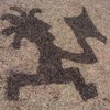 Not a swastika after all but a spray-painted Kokopelli with a hatchet.<br>
<br>
Photo by JB.