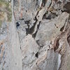 Mike Keegan half way up the 10+ dihedral pitch, this pitch was spectacular, the bolted belay up and 25 feet left of corner make viewing the pitch great.