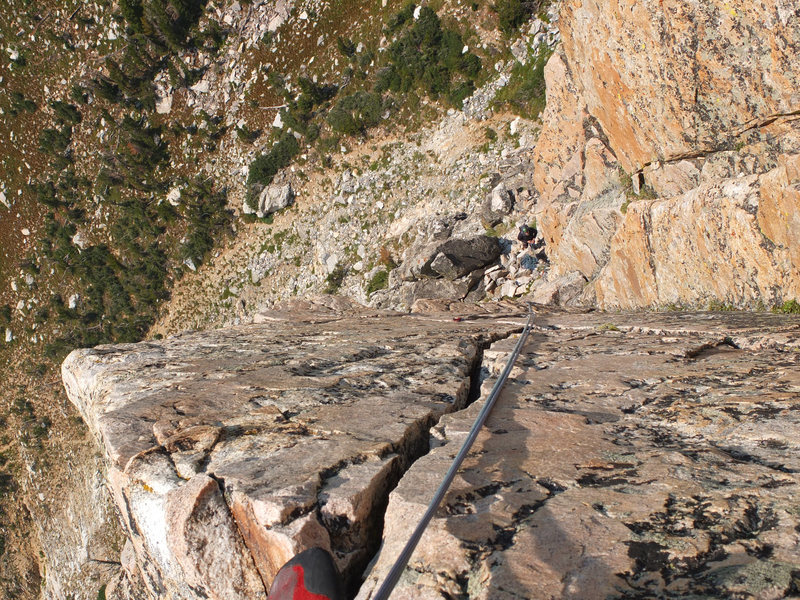 View down to the belay station at the start of the slick dihedral pitch.  Nice crack to finish.