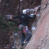 Curt MacNeill in the roof just before crux #1.