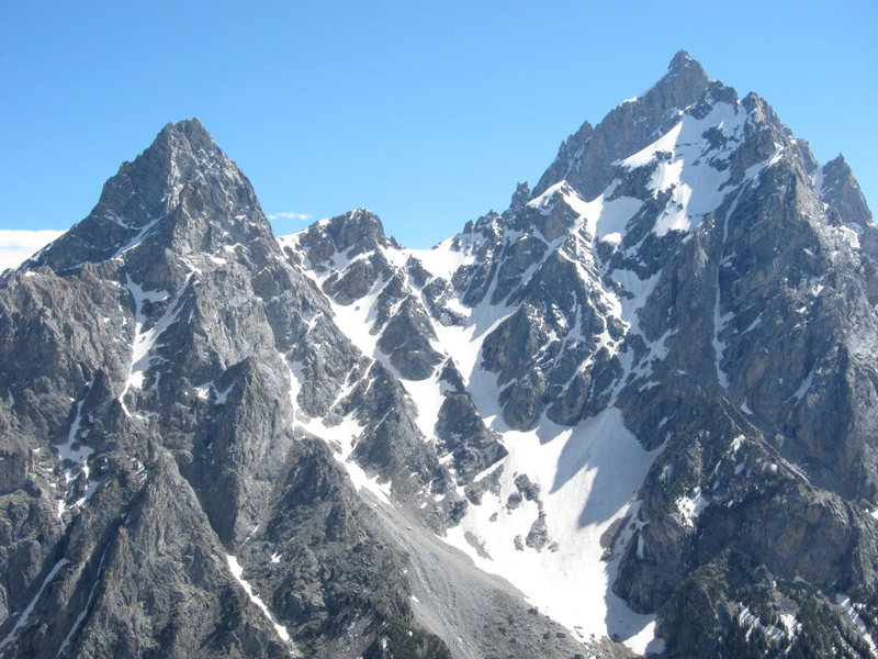 Teewinot, Owen, and the Grand Teton as seen from high on Symmetry Spire. (Mount Owen is directly in front of the Grand in this photo.)